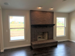 Fireplace w/ Brick Hearth